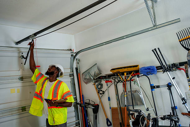 Professional Garage Door Roller Replacement technician working in Plymouth, IN